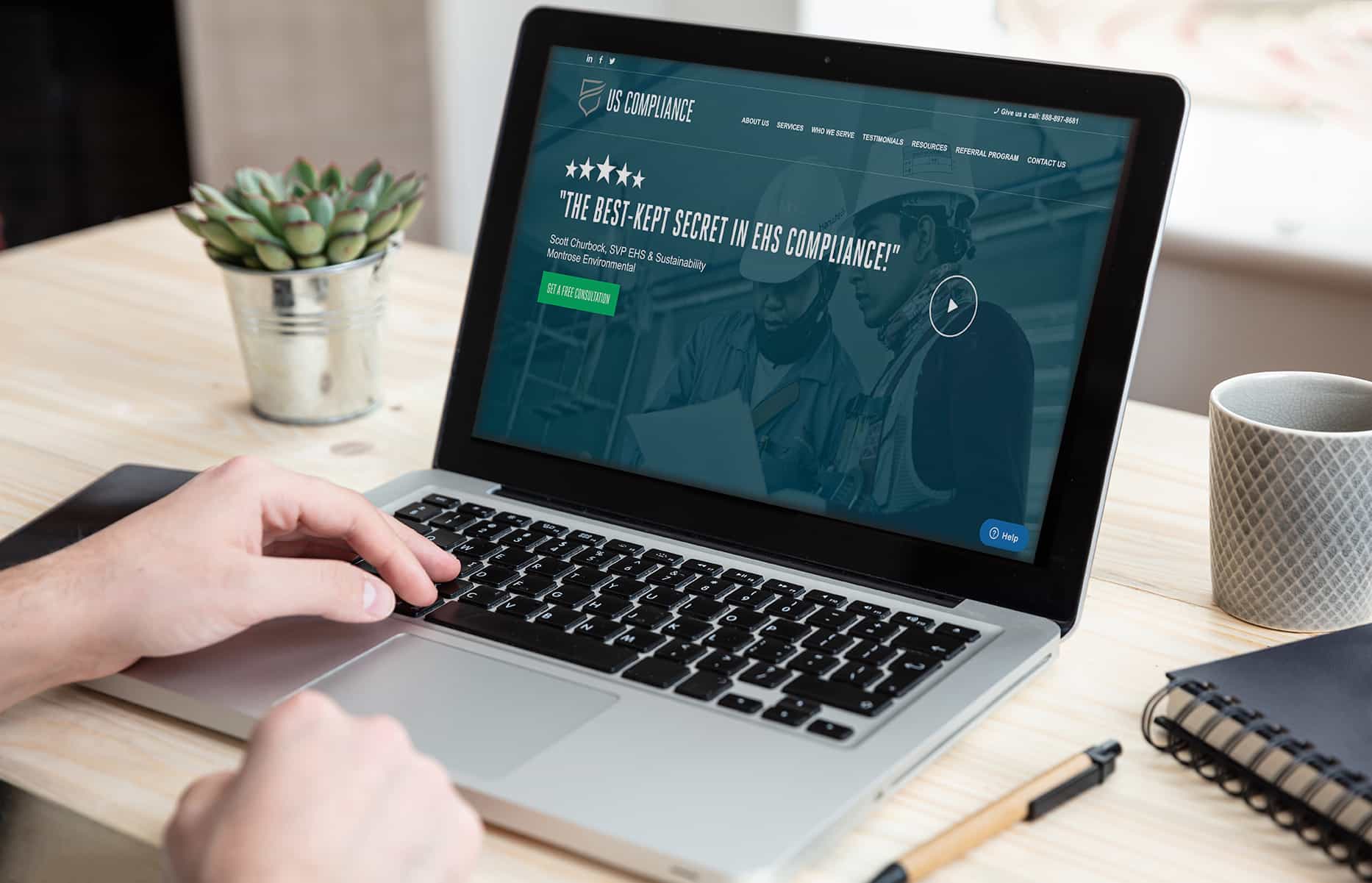 US Compliance - Laptop With Website