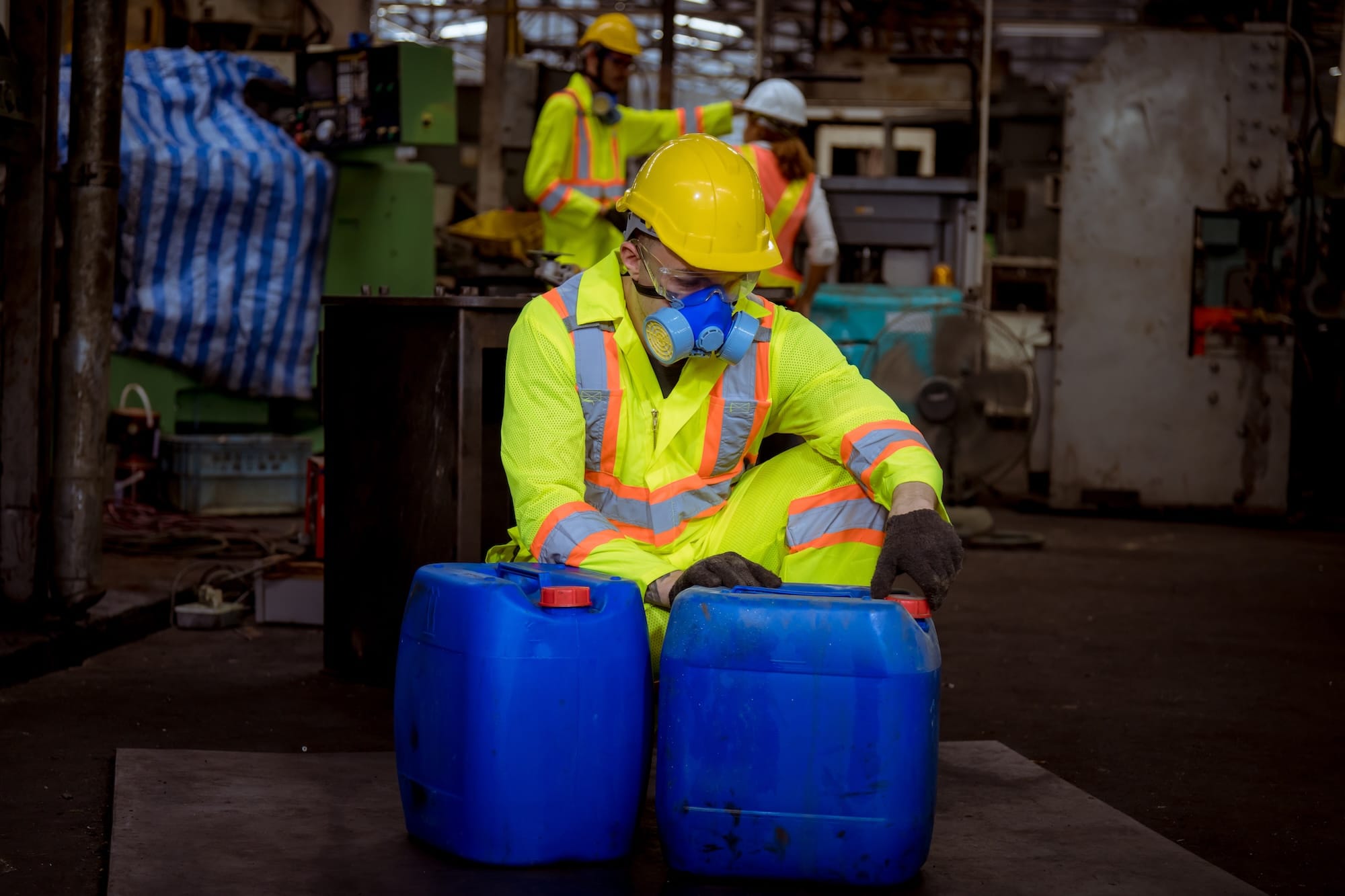 Man wearing respiratory mask in factory