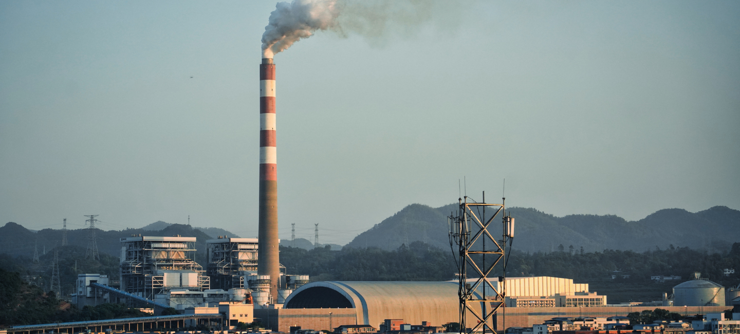 Factory smoke stack polluting the air