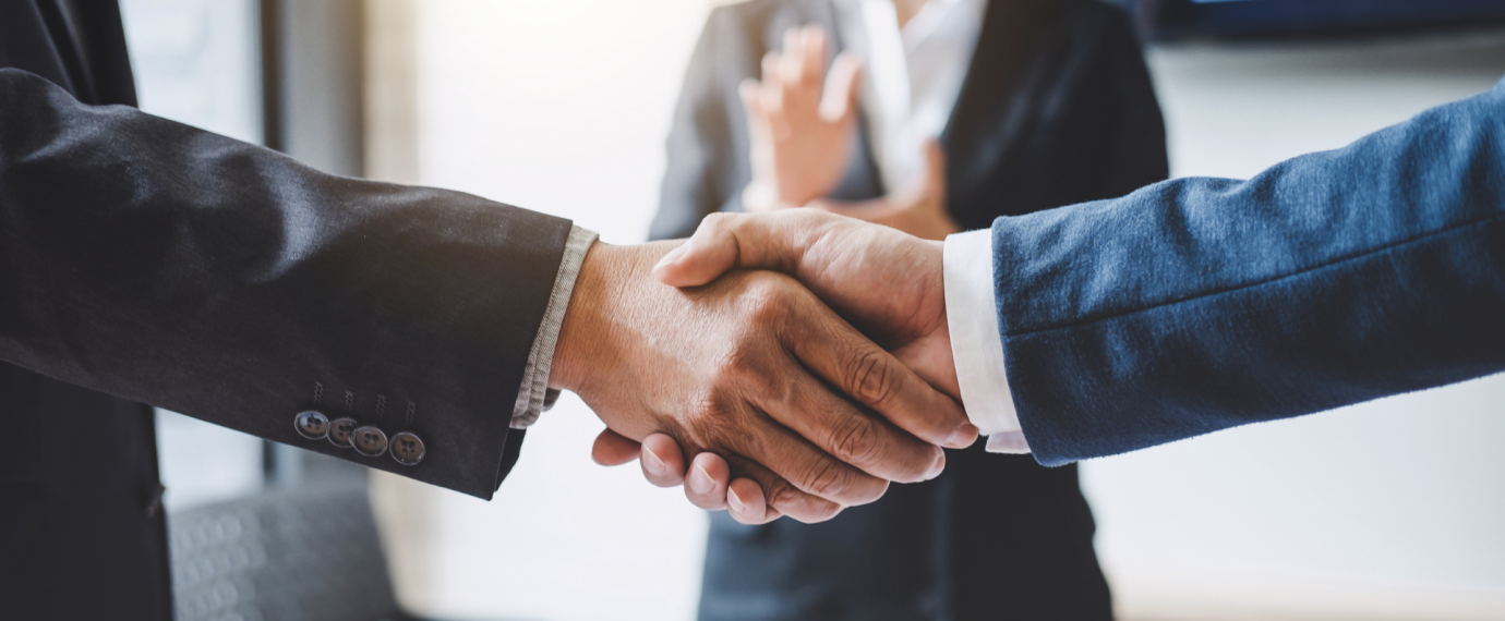 Business men shaking hands