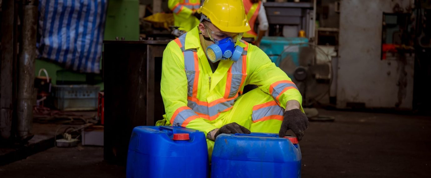 Man wearing respiratory mask in factory